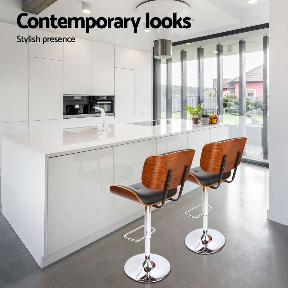 Artiss 4x Bar Stools in modern kitchen with chrome base and wooden seat structure.