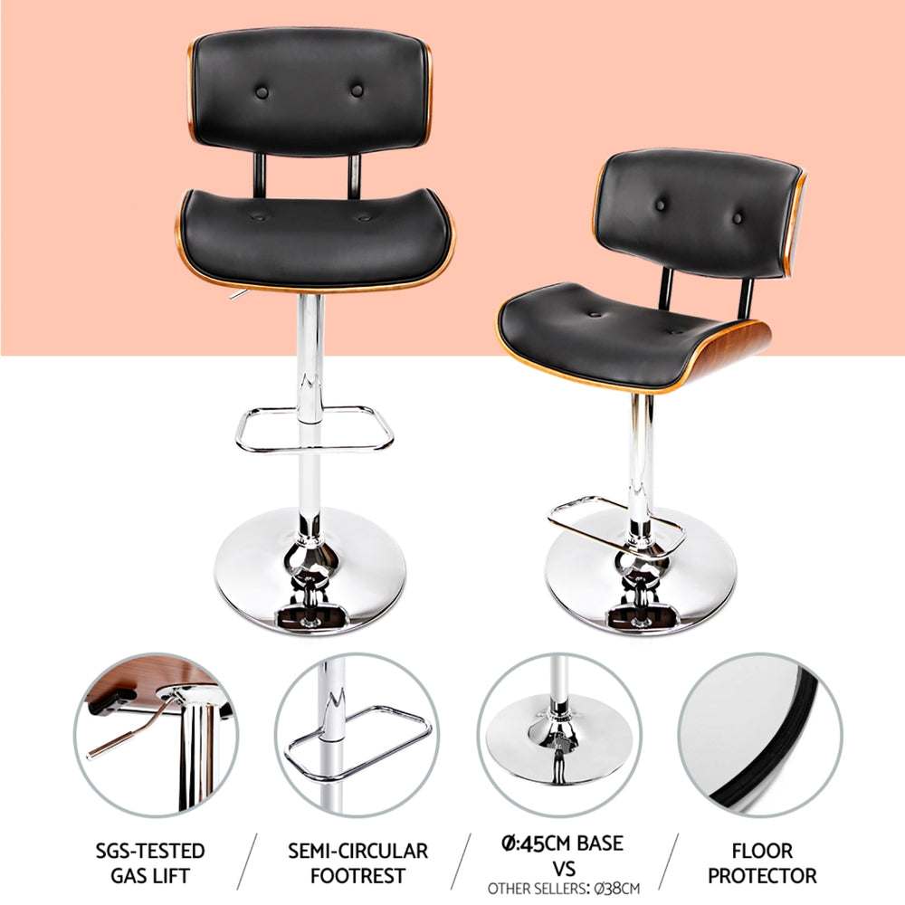 Artiss 4x Bar Stools Gas Lift Leather Black with chrome base and wooden seat structure.