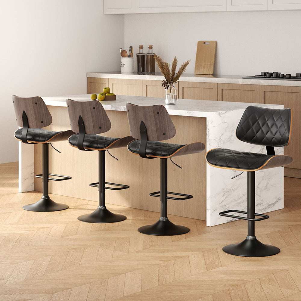Artiss 4x Bar Stools with black leather seats and wooden bentwood finish in modern kitchen setting.