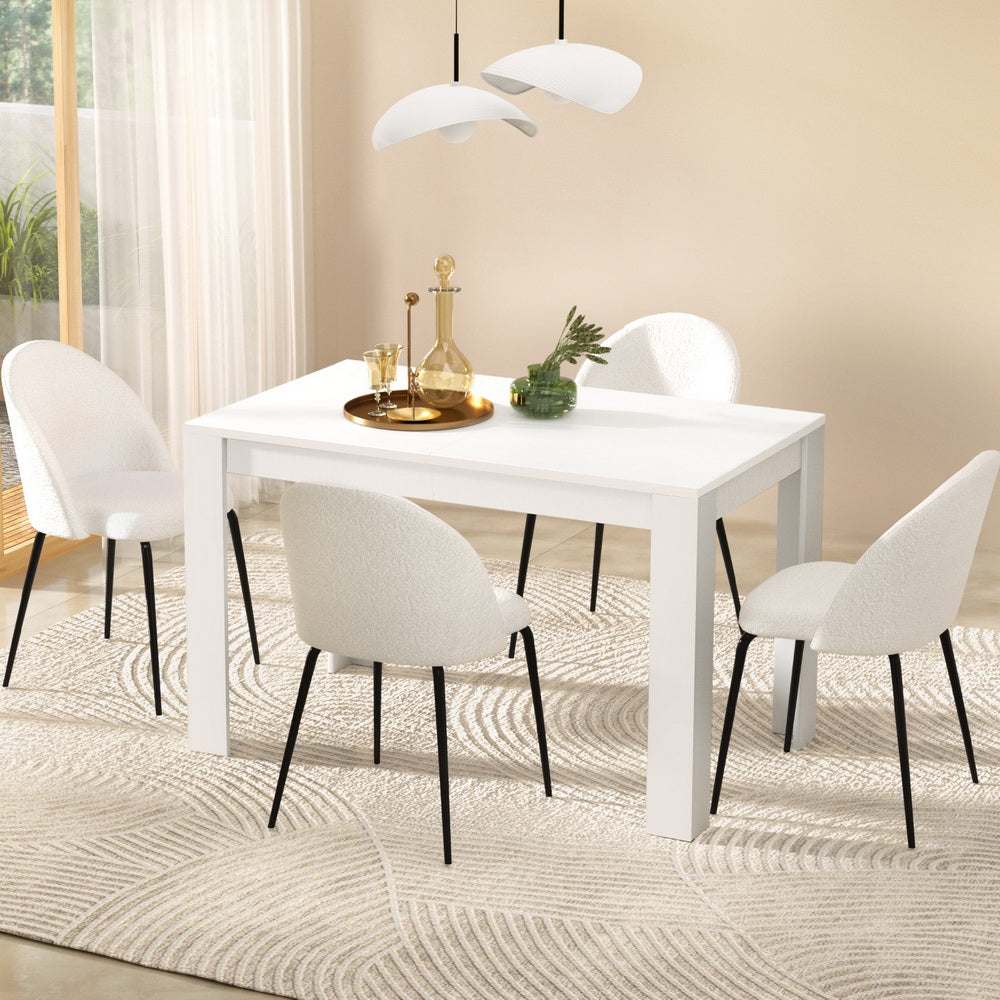 White Artiss Dining Table and 4 Sherpa Chairs Set in modern room.