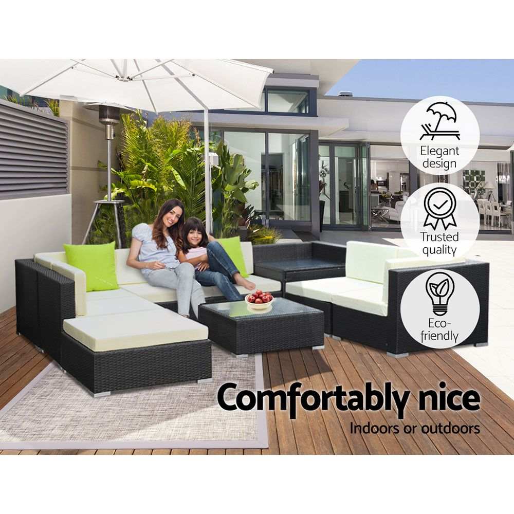 Gardeon 9-piece outdoor sofa set with wicker couch, table, corner table, and ottoman on a patio.