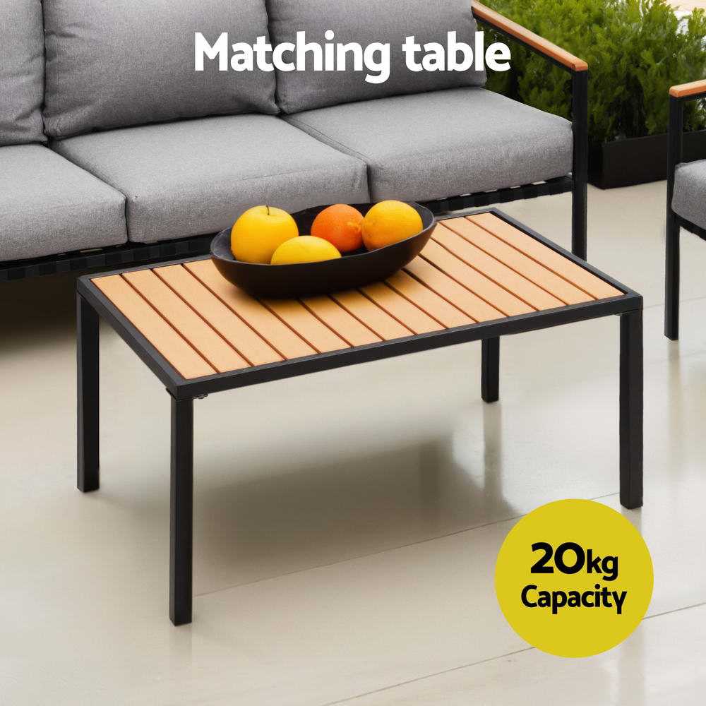 Outdoor patio set with 5-seater sofa and matching table, powder-coated steel frame, grey cushions, 20kg table capacity.