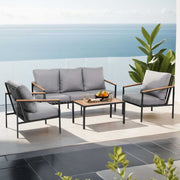 Gardeon 5 seater outdoor sofa set on patio with ocean view, featuring grey cushions and a center table.