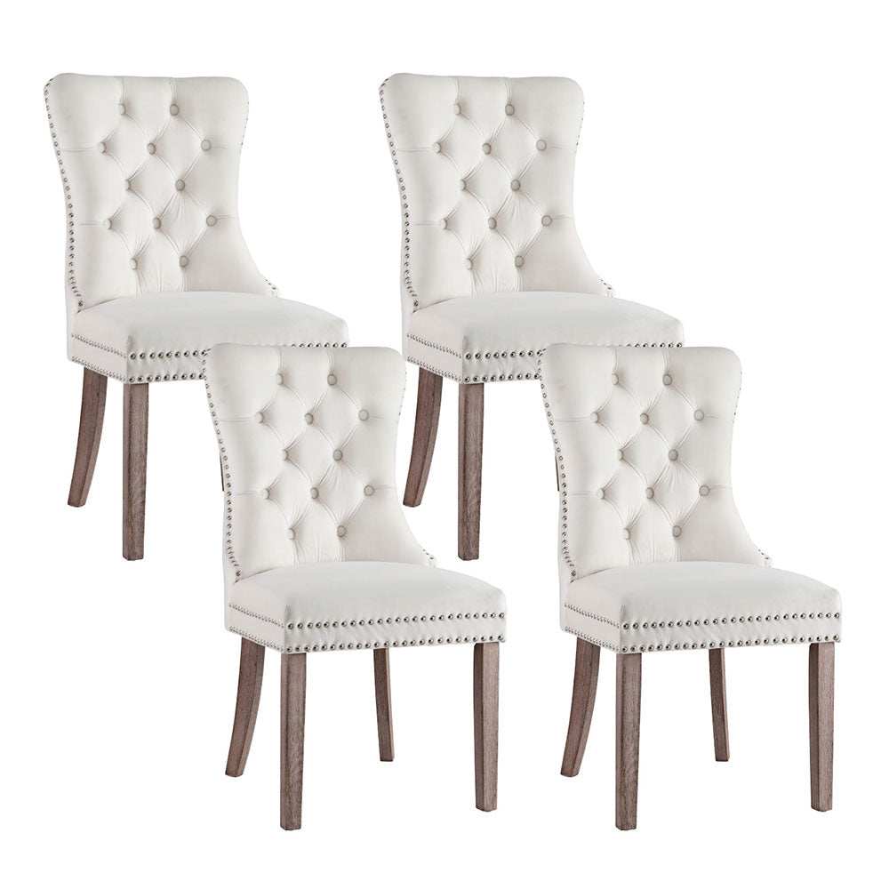 Set of 4 beige velvet Artiss dining chairs with button-tufted backrest and rubberwood legs.