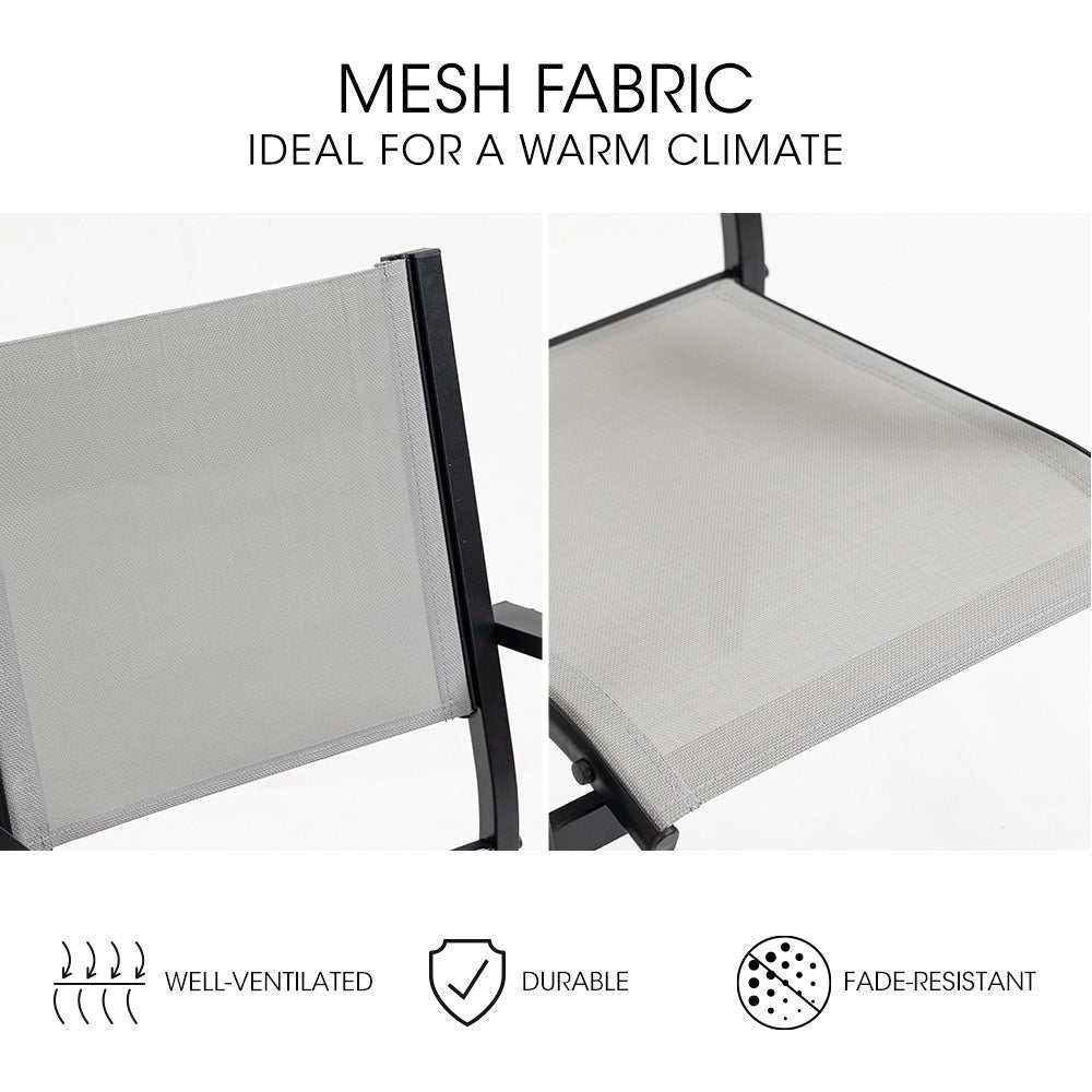 Mesh fabric chairs of Fortia 7pc Outdoor Dining Set, well-ventilated and fade-resistant, ideal for warm climates.