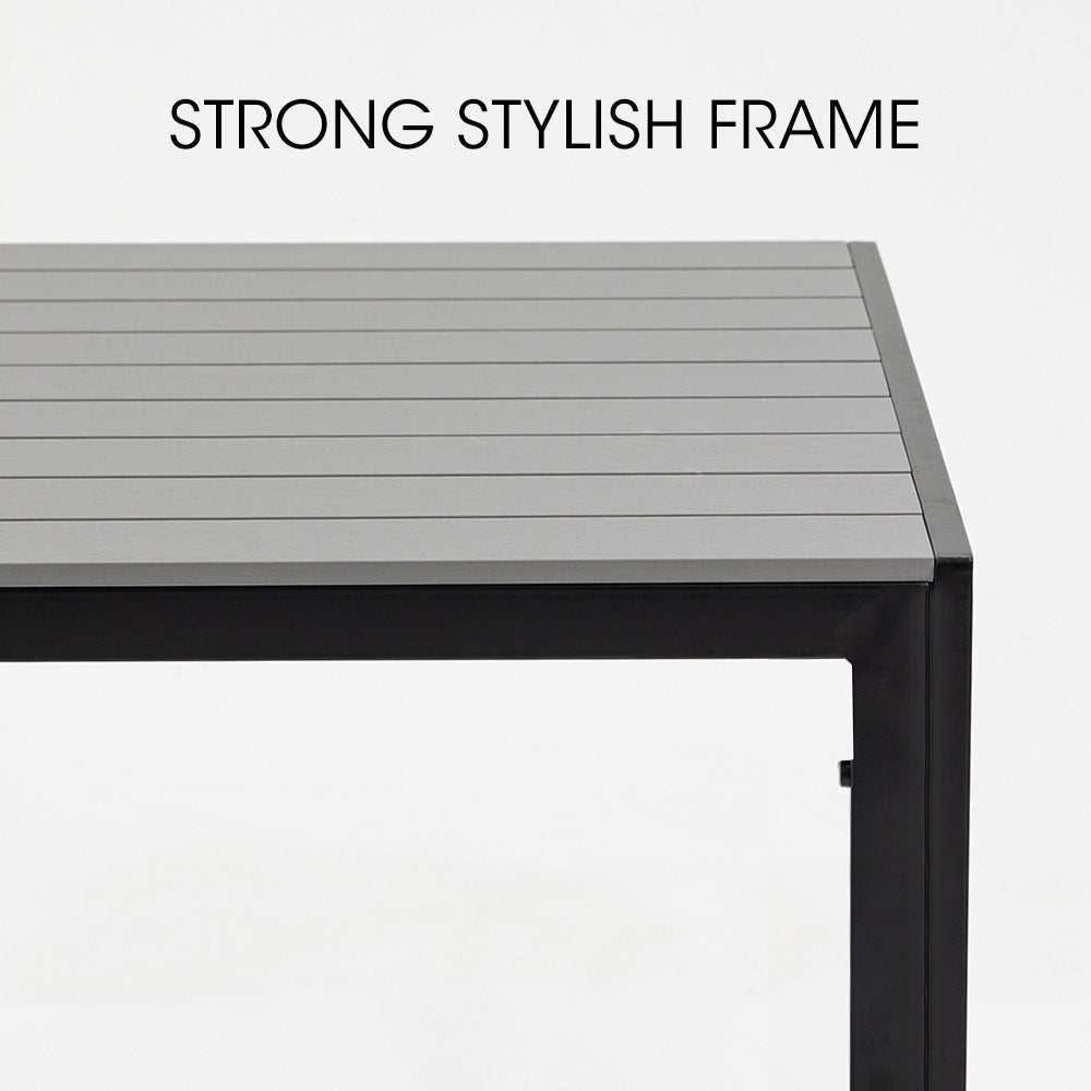 FORTIA 7pc Outdoor Dining Furniture Set with stylish rust-resistant frame.