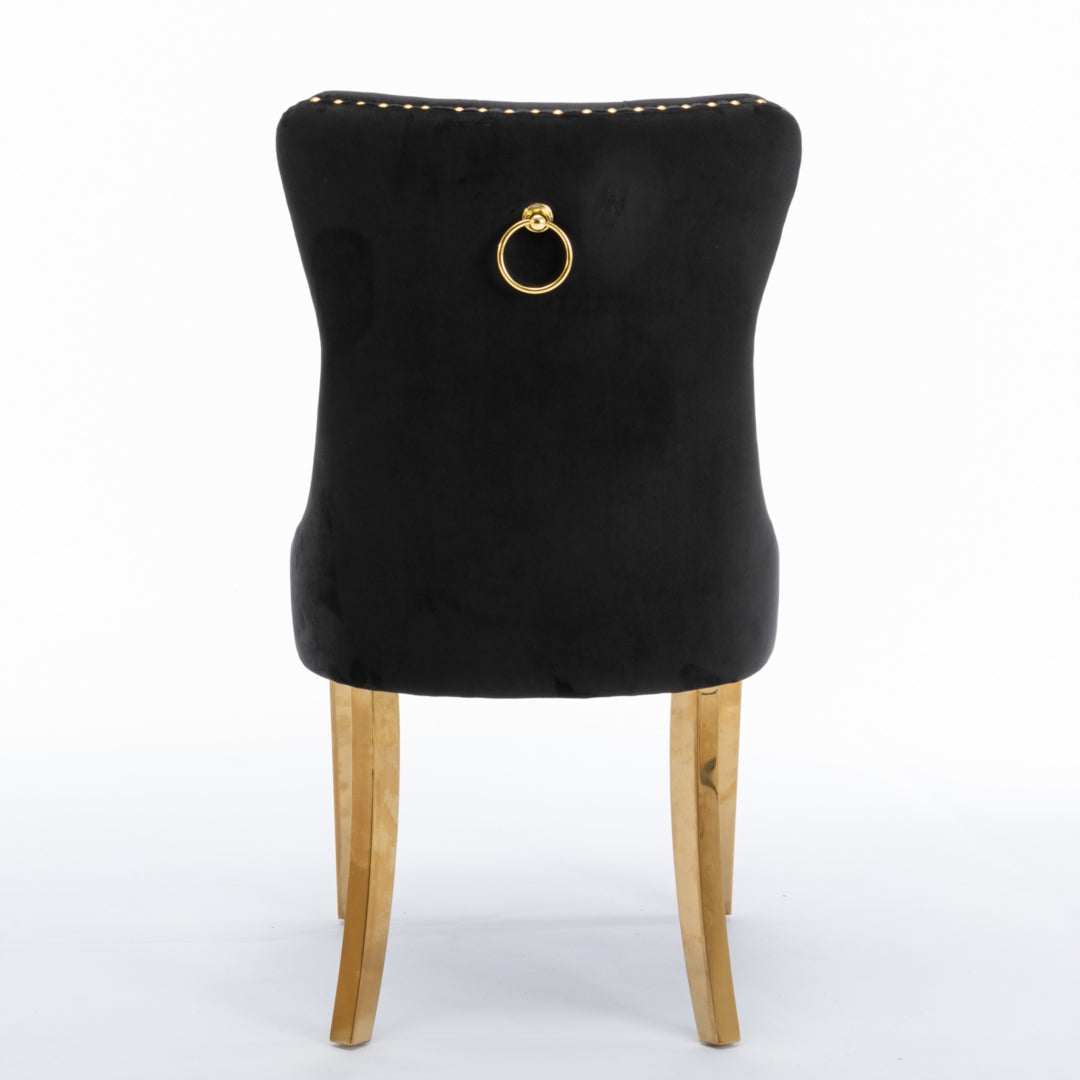 Black velvet dining chair with gold metal legs and decorative back pull-out ring.
