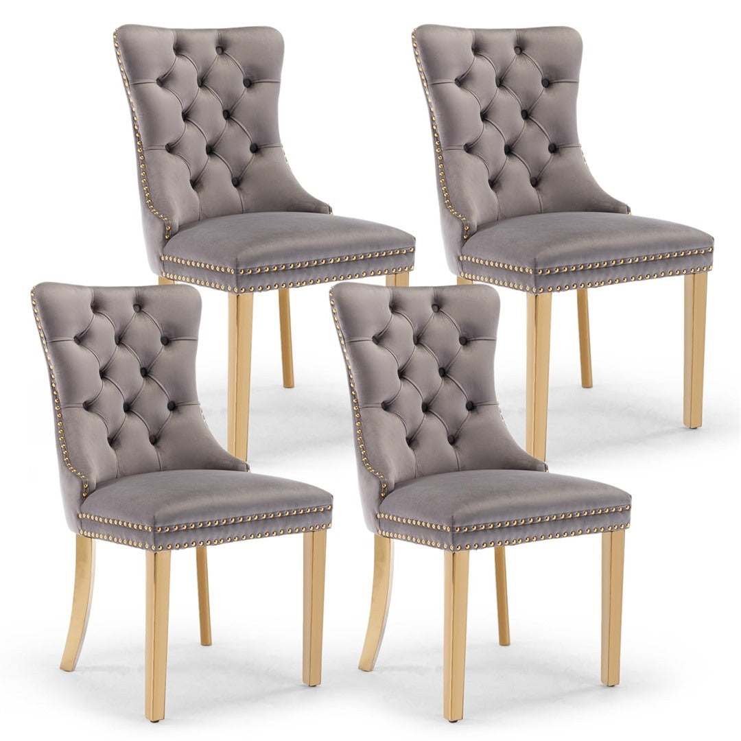 Velvet dining chairs with golden metal legs in grey, featuring an elegant button-tufted design and a high backrest for added comfort.