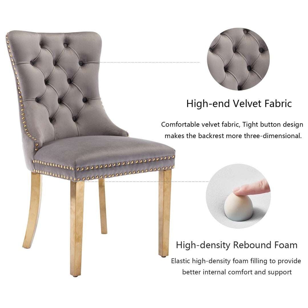 Velvet dining chair with gold metal legs and button-tufted grey upholstery.