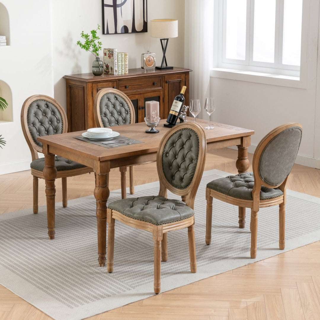 Velvet faux leather dining chairs with solid wood legs in pine green, featuring hand-tufted decor and nailhead trim.