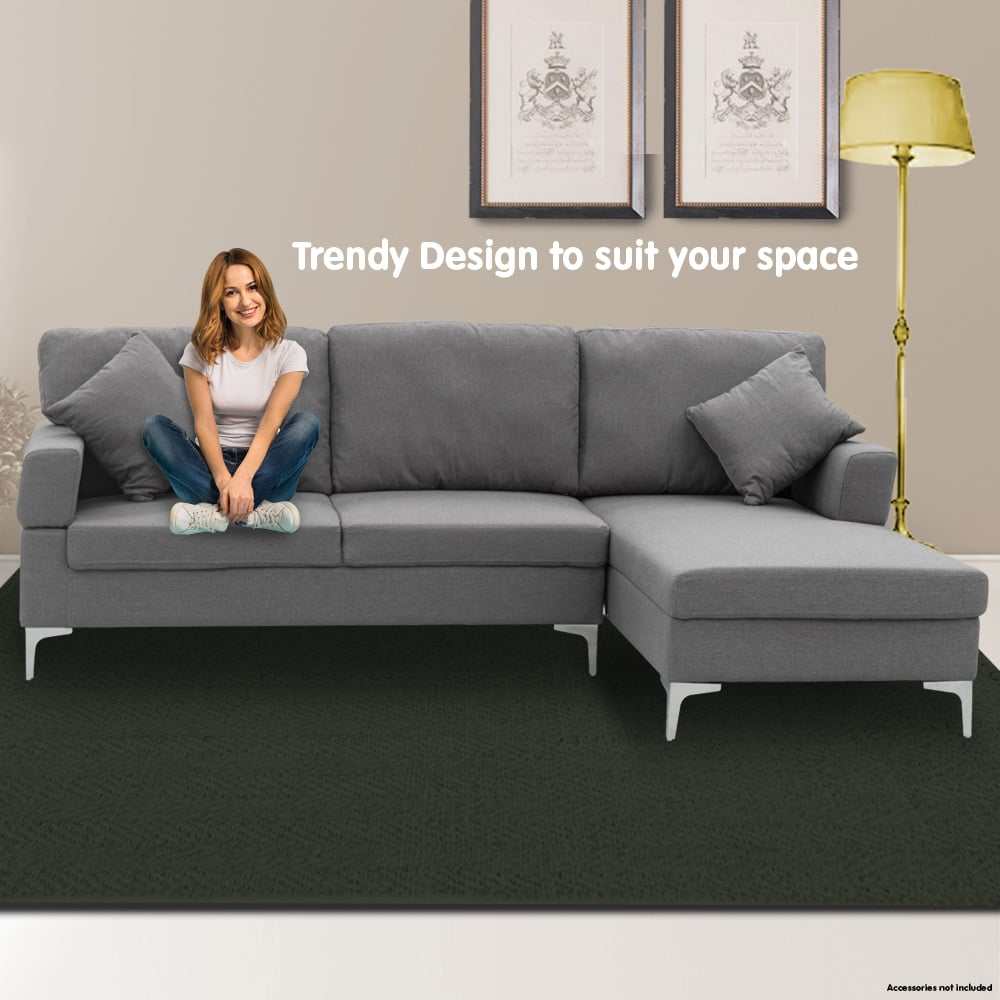 Dark grey Sarantino 3 seater linen sofa with left side chaise, featuring chrome legs and high-density foam cushions for modern comfort.