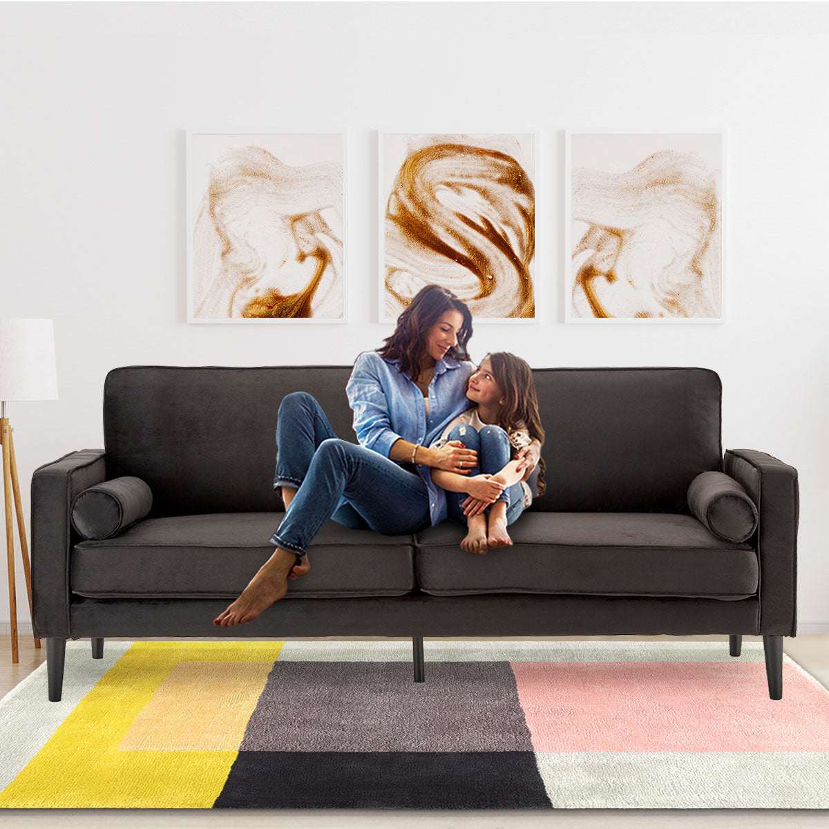 Sarantino Faux Velvet Sofa Bed Couch in black with modern design and wooden legs.
