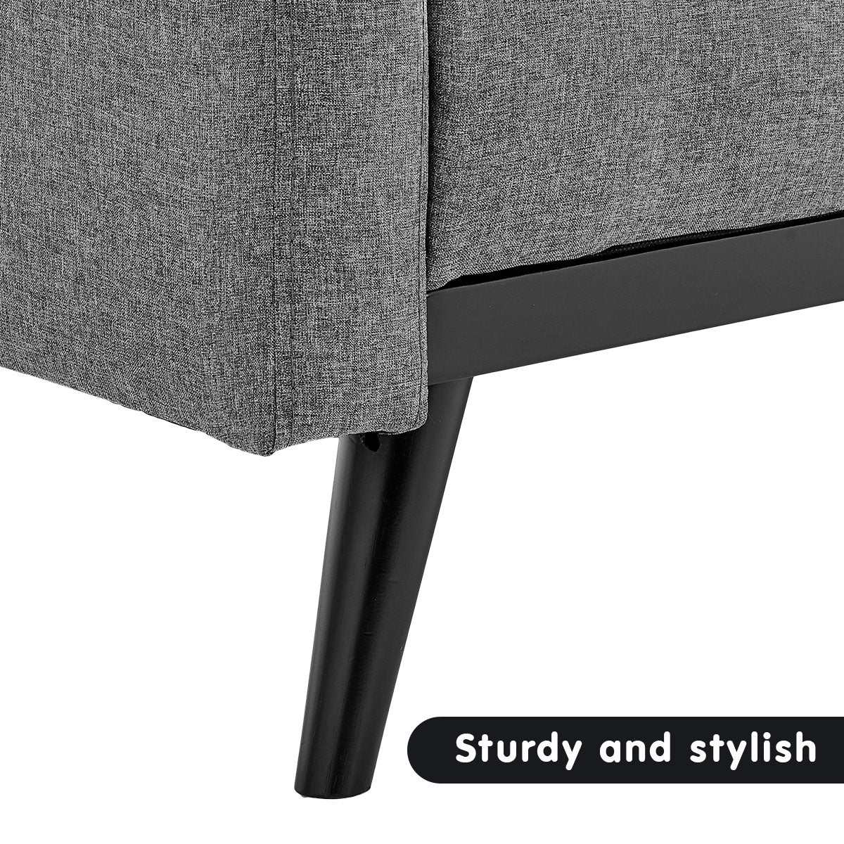 Light grey Saratino tufted faux linen 3-seater sofa bed with wooden legs and armrests.