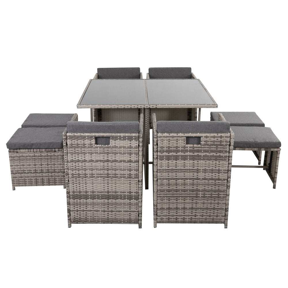 Horrocks 8 Seater Outdoor Dining Set in grey with rattan design, glass-top table, and included cushions.