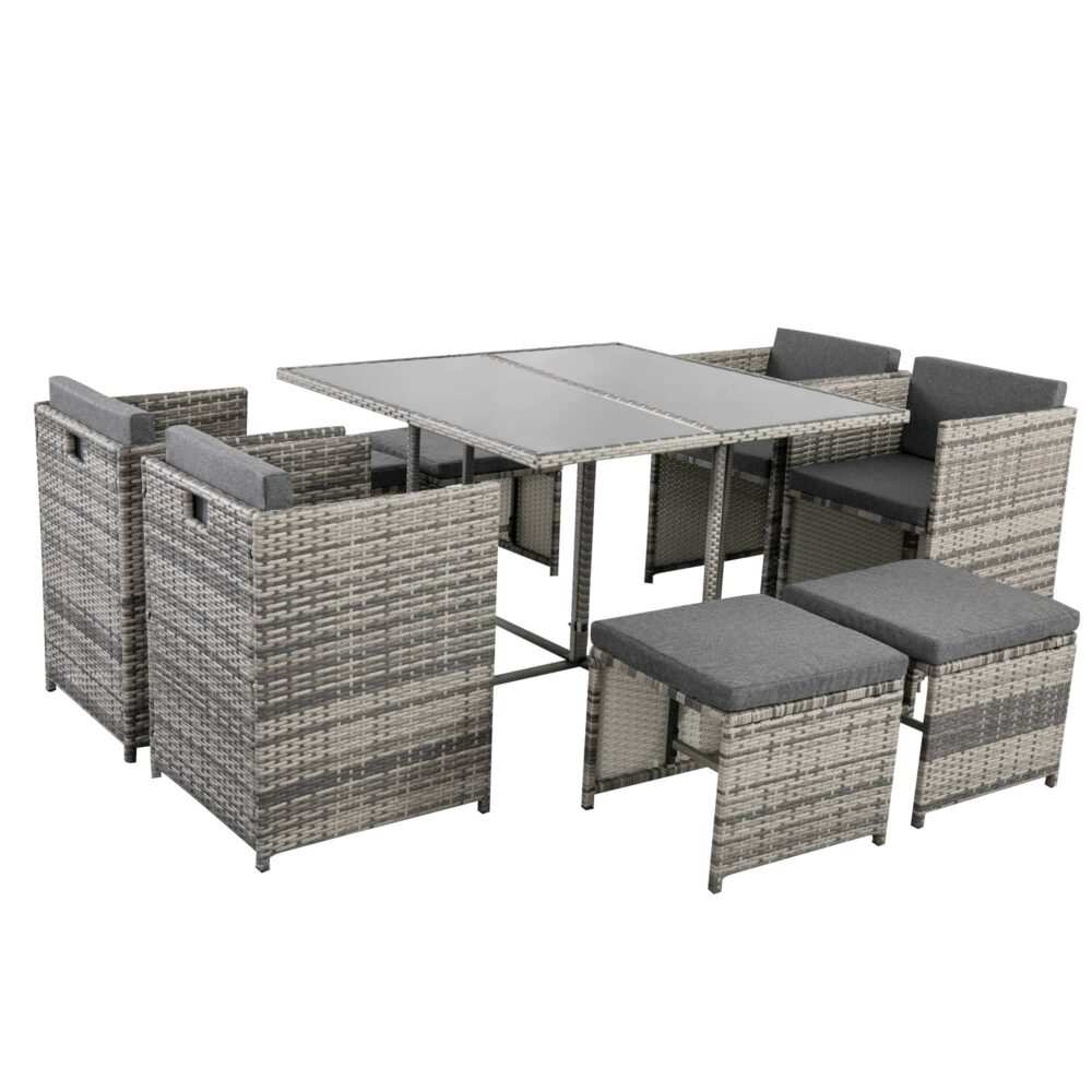 Horrocks 8 Seater Outdoor Dining Set in Grey with rattan design, including a rectangle table with tempered glass top, armchairs, ottomans, and cushions.