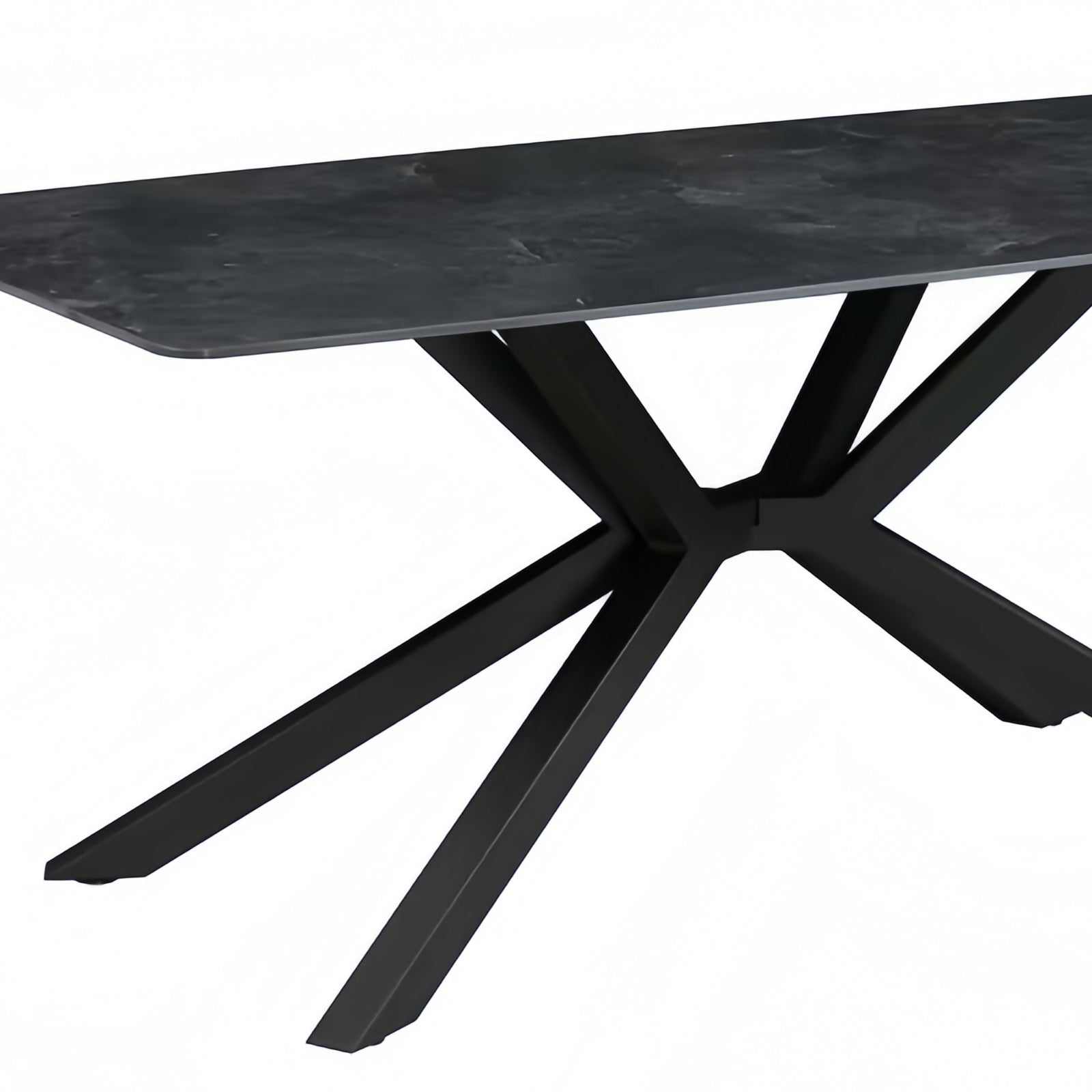Dining table with green sintered stone top and powder-coated iron legs in a modern, rectangular design.