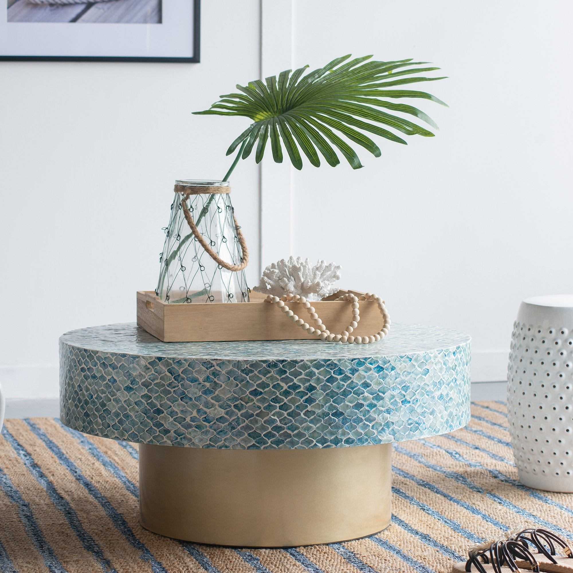 GOA SHELL COFFEE TABLE with blue shell covering, featuring island style and unique light-reflective design.