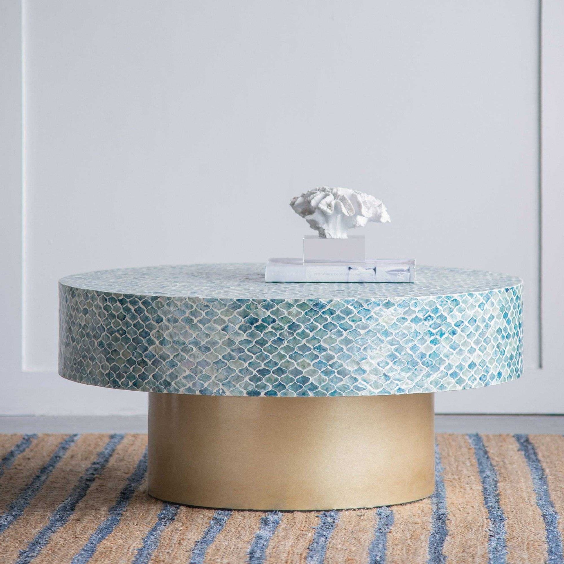 GOA SHELL COFFEE TABLE with blue shell pieces on white background.