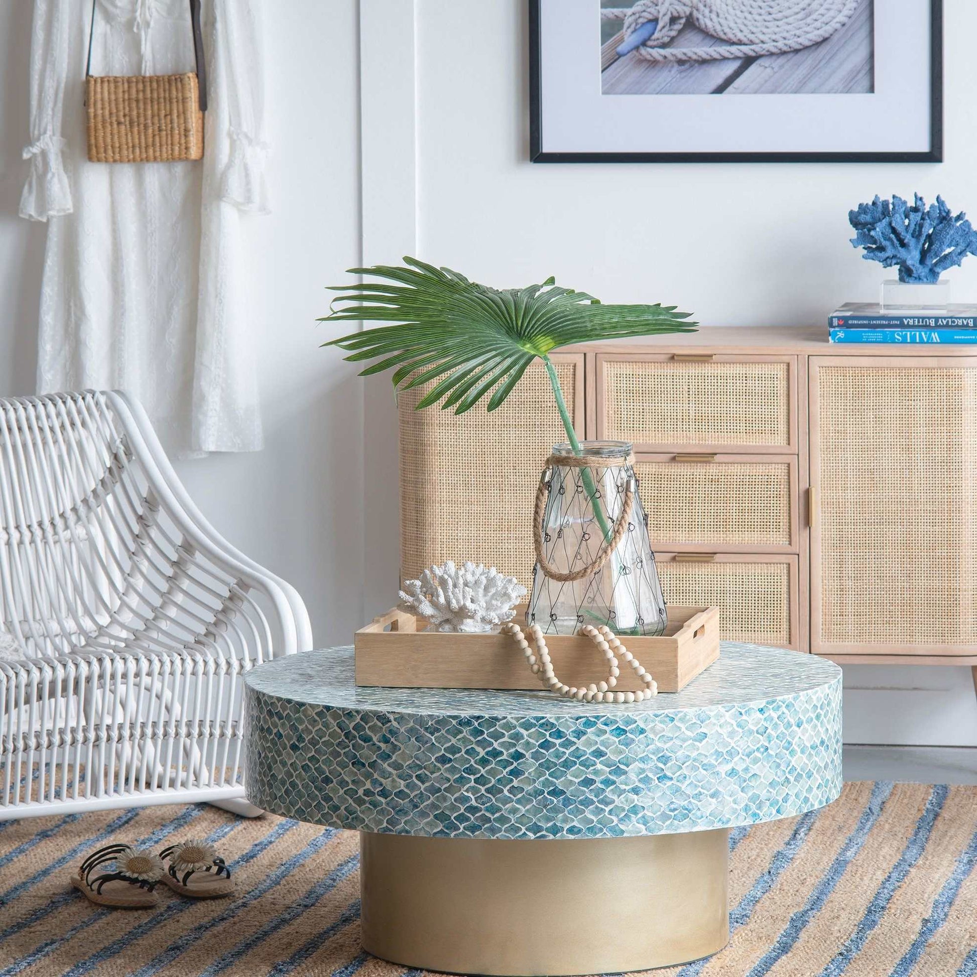 GOA SHELL COFFEE TABLE with blue hued shell pieces, island-style design in a cozy room setting.