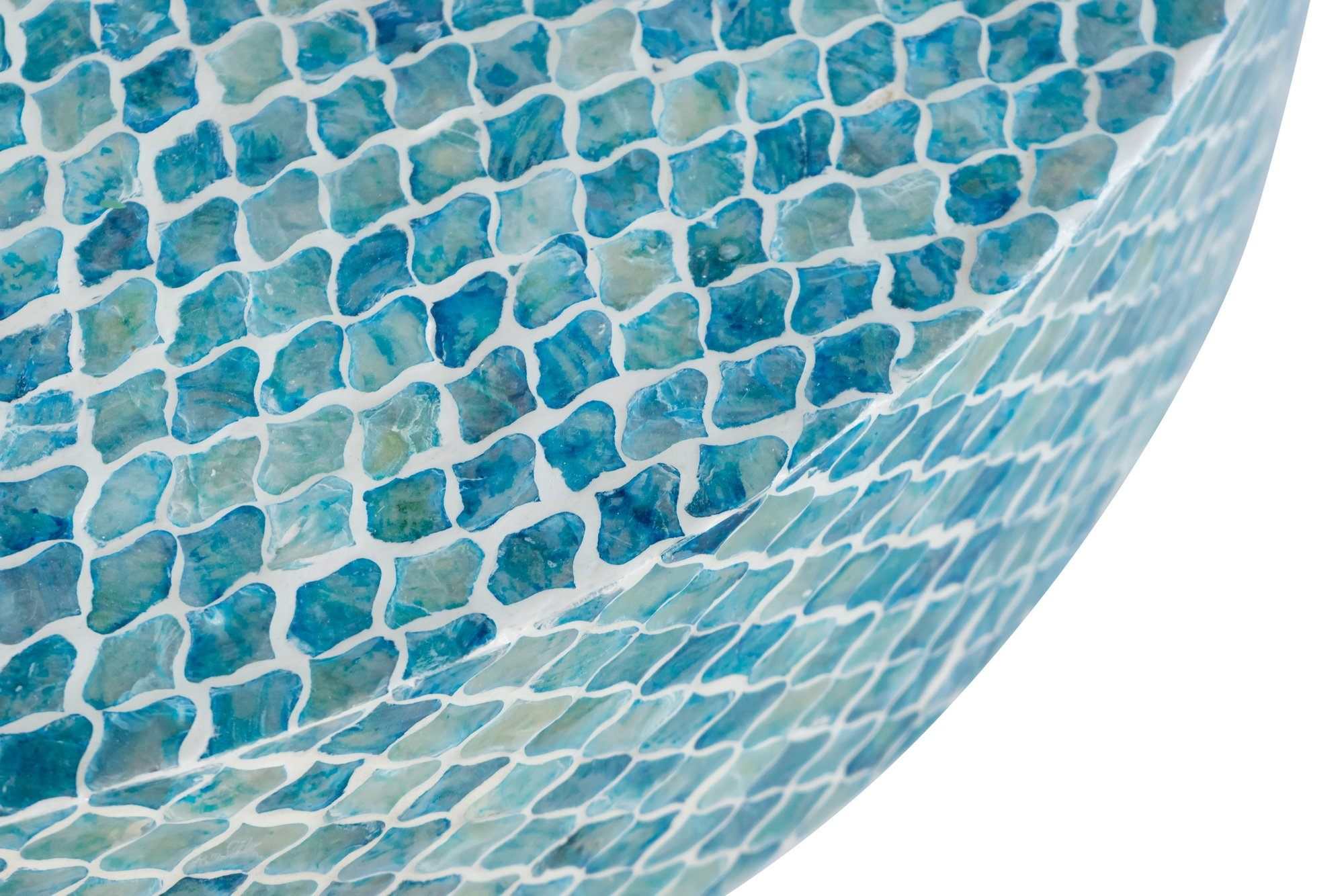 Close-up of blue-hued shell pieces on the GOA SHELL COFFEE TABLE.