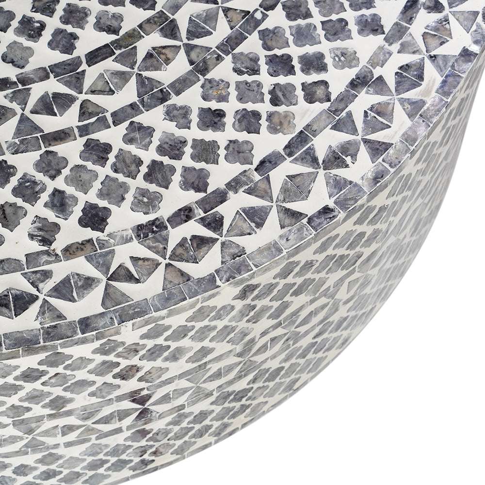 Diamond patterned black and white coffee table with mother of pearl and seashell embellishments.