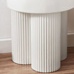 white ribbed side table