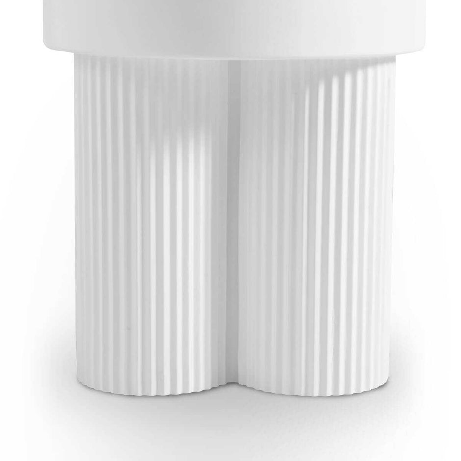 white ribbed side table