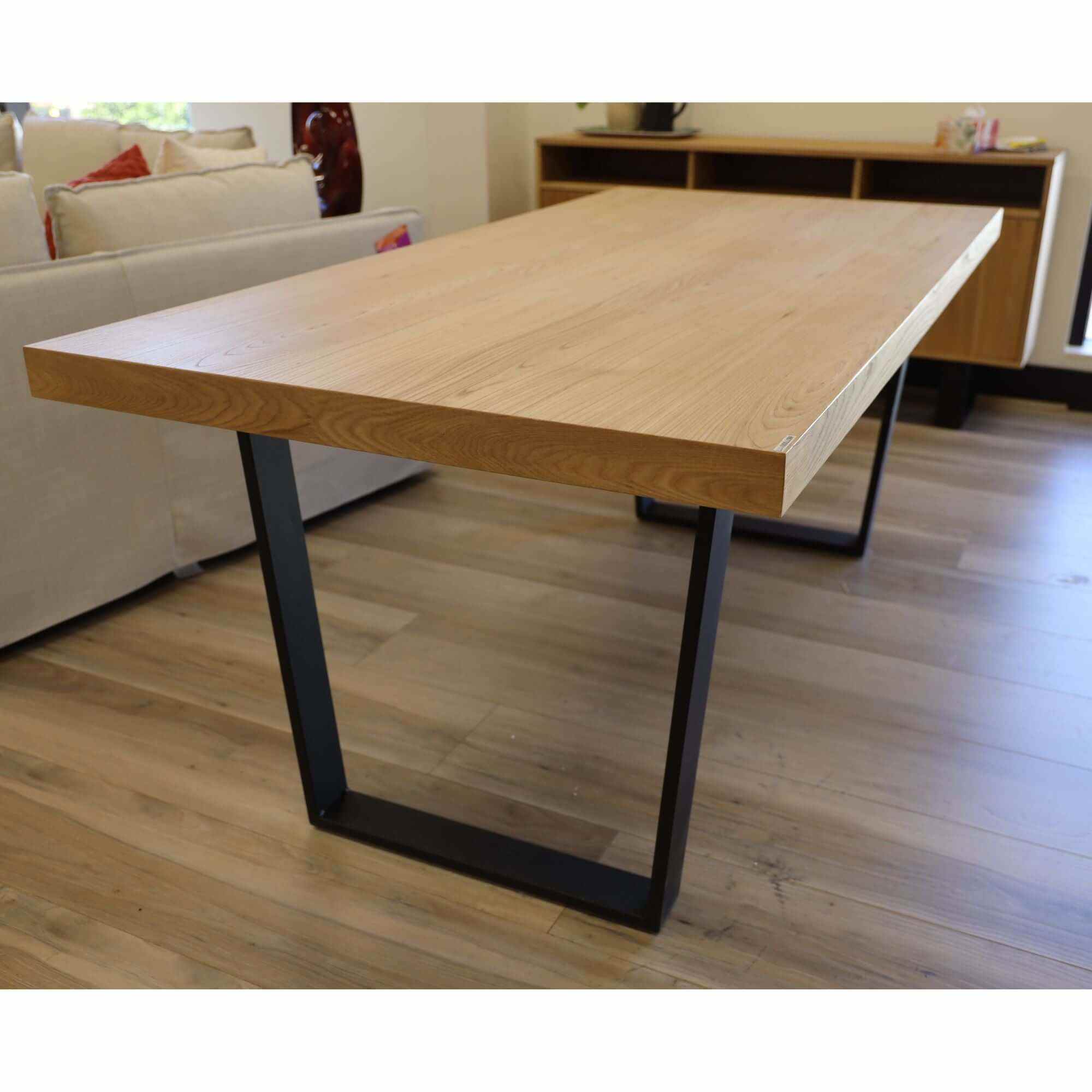 wood dining table with black metal legs