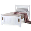 white wooden single bed